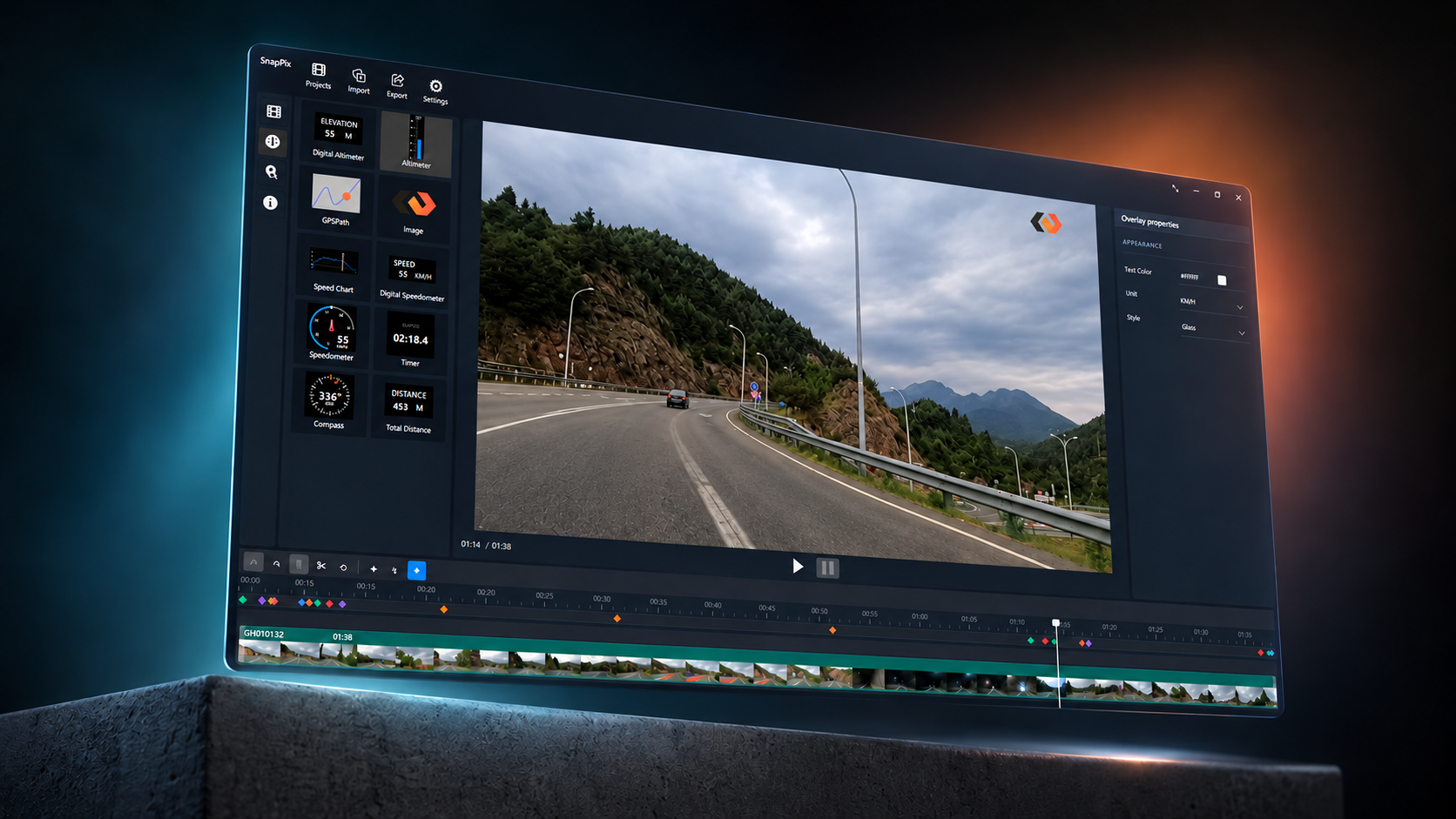 SnapPix editing mountain-road footage, presented at an angle above a concrete plinth.
